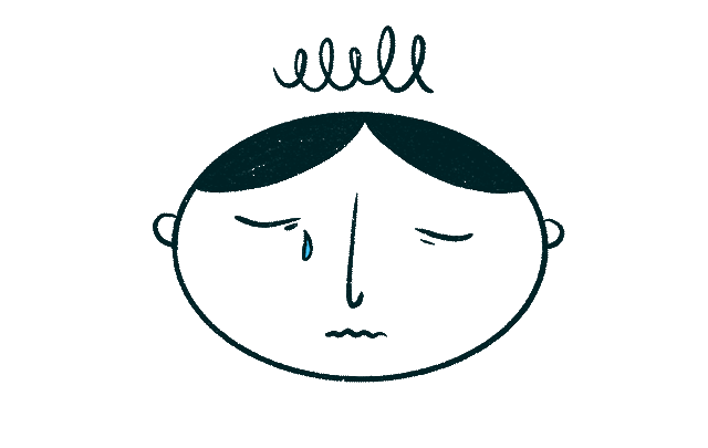 A person crying and looking stresses