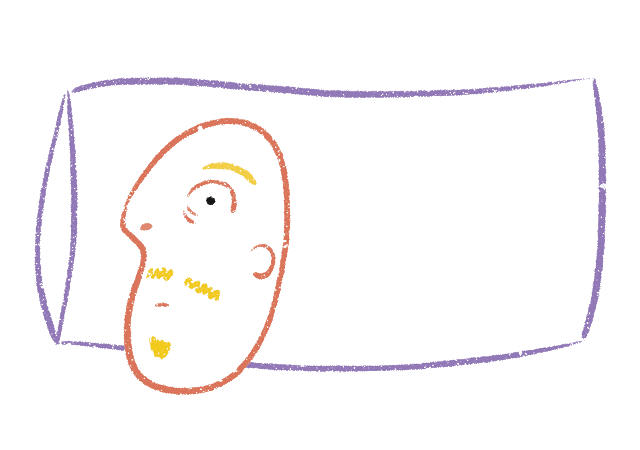 A man tossing and turning on a pillow